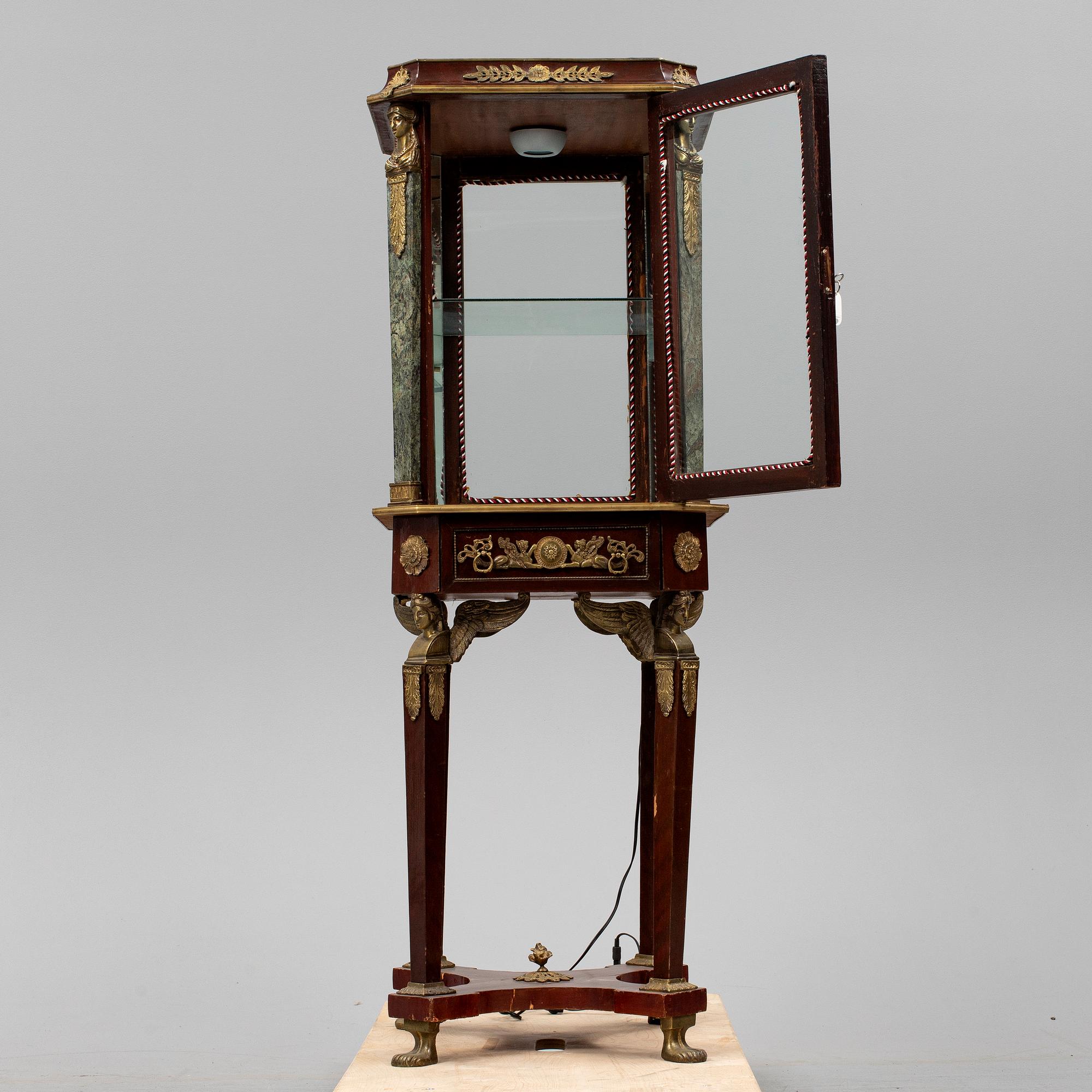 An Empire style cabinet, mid 20th Century.