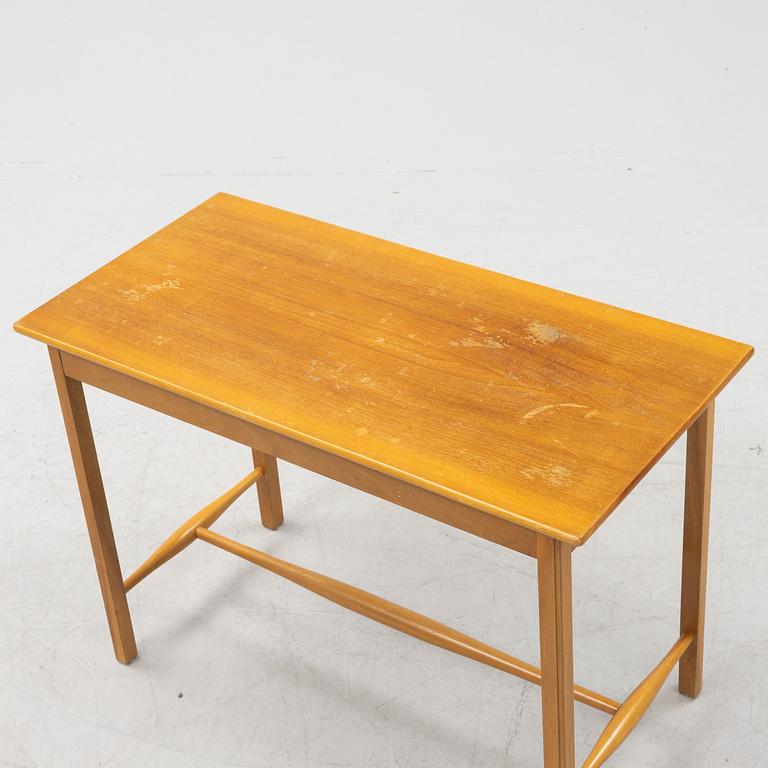 Josef Frank, a model 1106 walnut table, Firma Svenskt Tenn, Sweden.