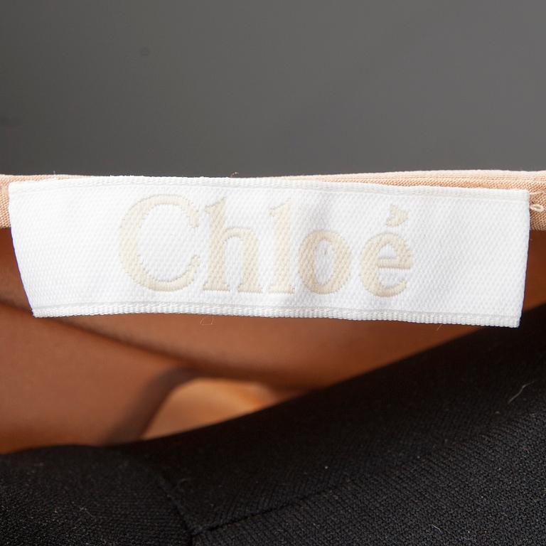 BLUS, Chloé.