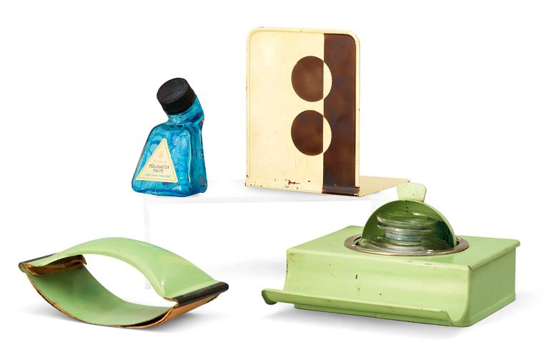 A Marianne Brandt enameled metal inkstand, a stamp dryer, and a bookend, Ruppelwerk, Gotha, Germany 1930's.