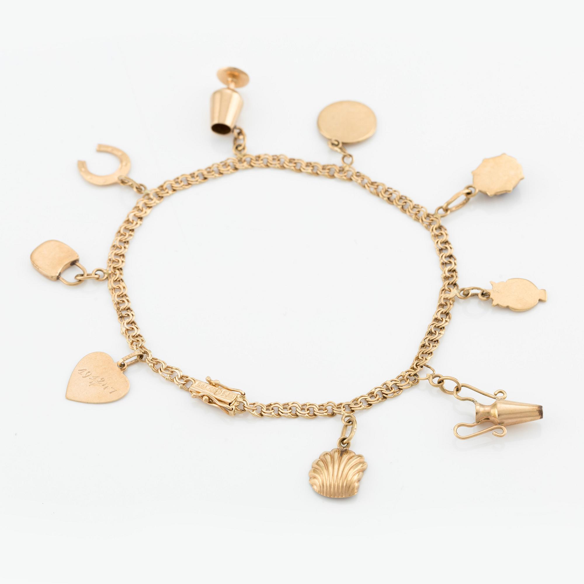 Armband, 18K guld, med berlocker.