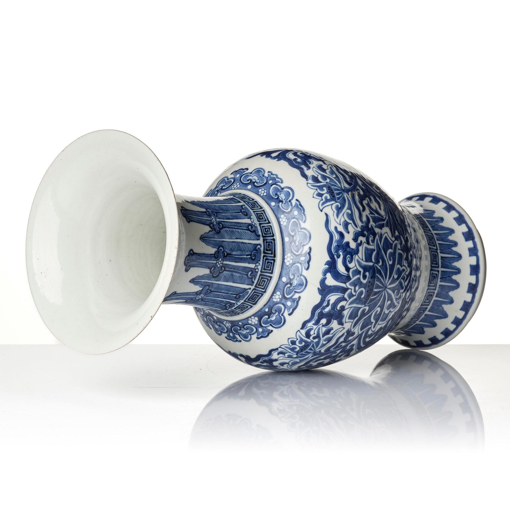 A blue and white 'lotus' yenyen vase, Qing dynasty, 19th century.