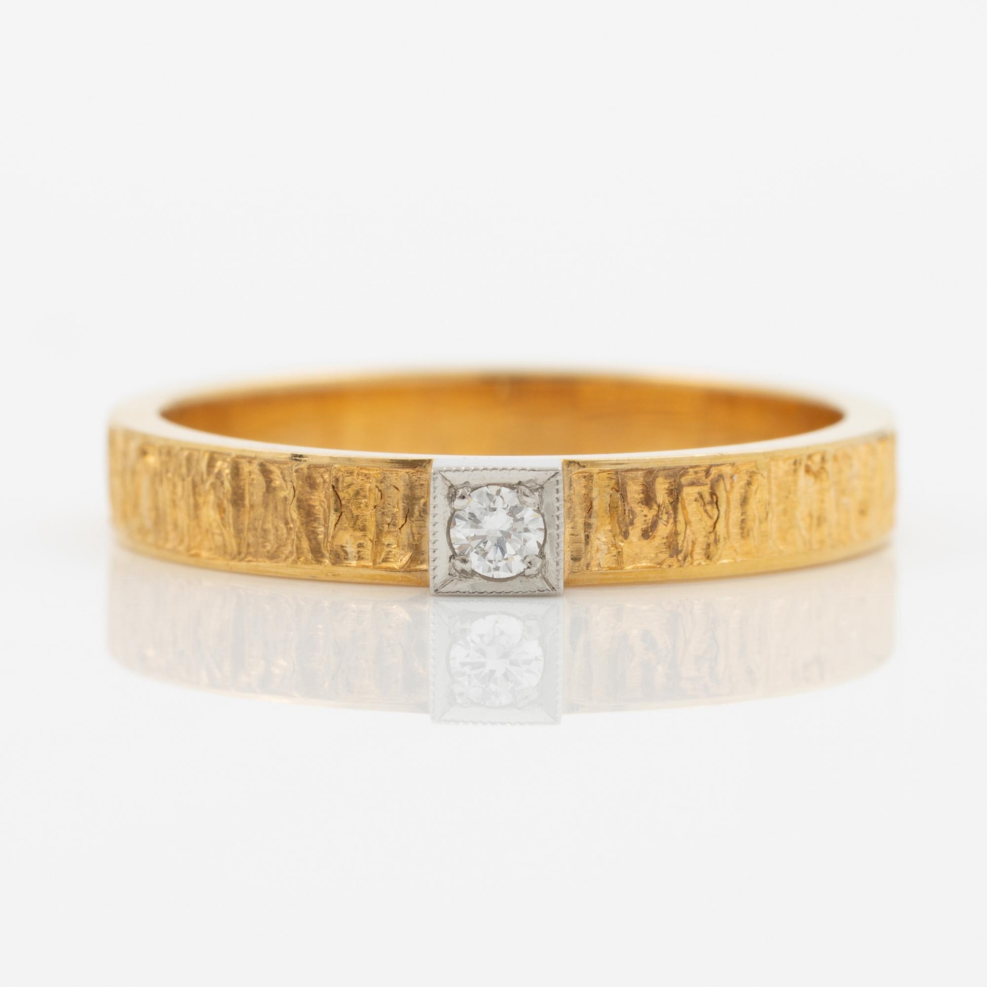 Lapponia, ring, 18K gold set with a round brilliant-cut diamond, Finland 1977.