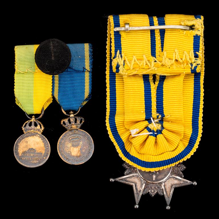 A Swedish ("Badge of the Sword") medal state decoration and two miniatures, silver.