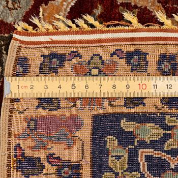 An antique silk rug, probably Istanbul, Turkey, c. 181 x 127 cm.