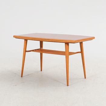 A 1960s teak coffee table.