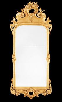 620. A Swedish Rococo mid 18th century mirror in the manner of C. Hårleman.