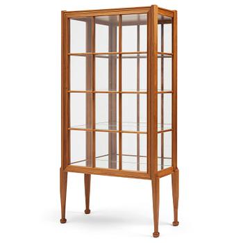 Josef Frank, a walnut display cabinet model "B 2217", Firma Svenskt Tenn, Sweden, 1950s-60s.