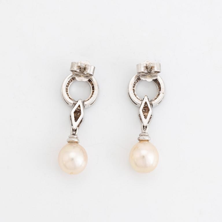 Pearl and brilliant cut diamond earrings.