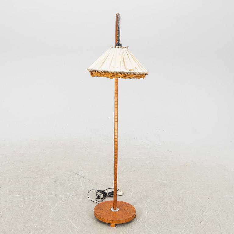 A 1940s floor lamp.