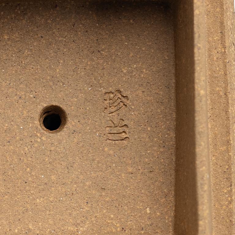 Two yellow yixing teapots, China, 1980/90s.