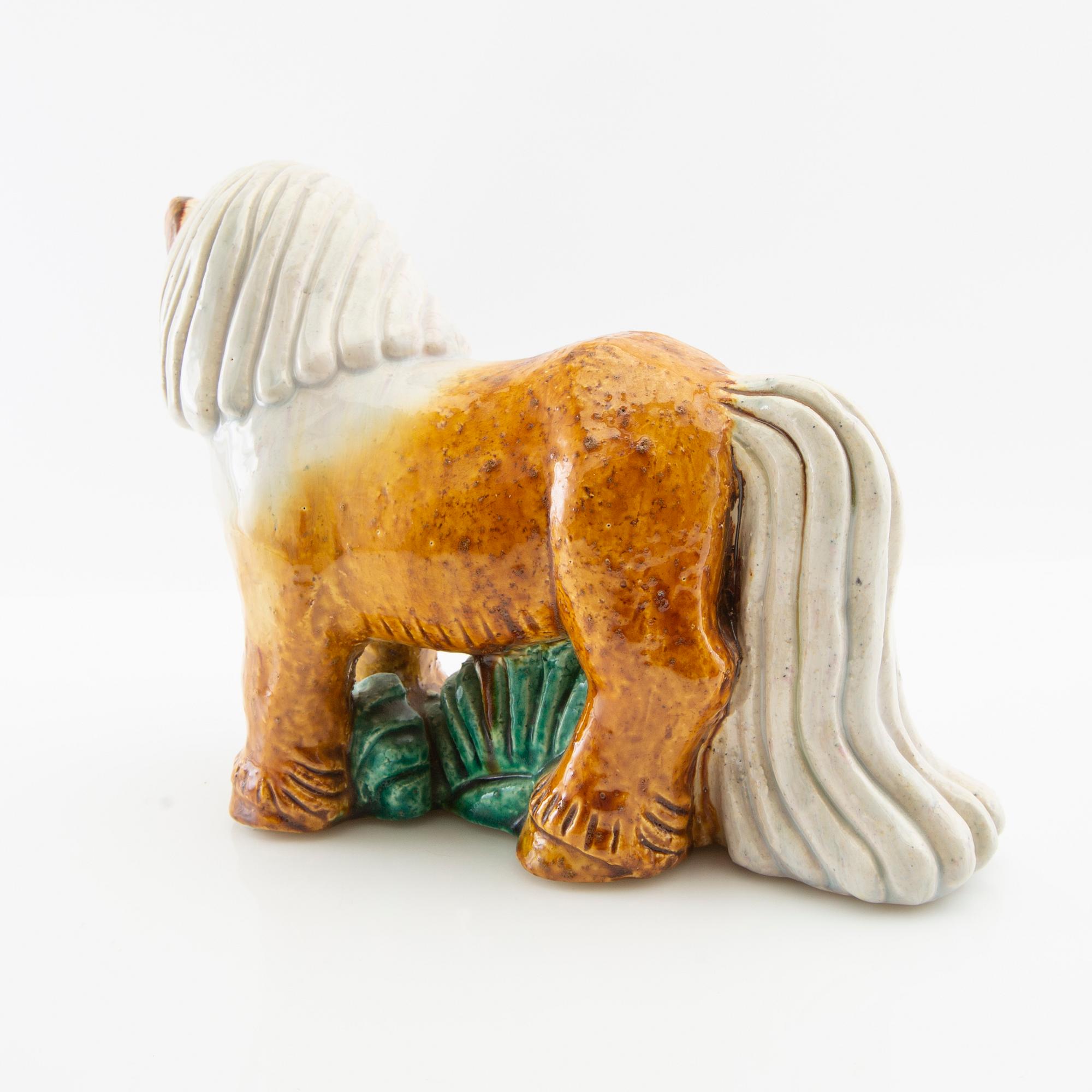 Gunnar Nylund, figurine with a chamotte stoneware glaze, Rörstrand, mid-20th century.