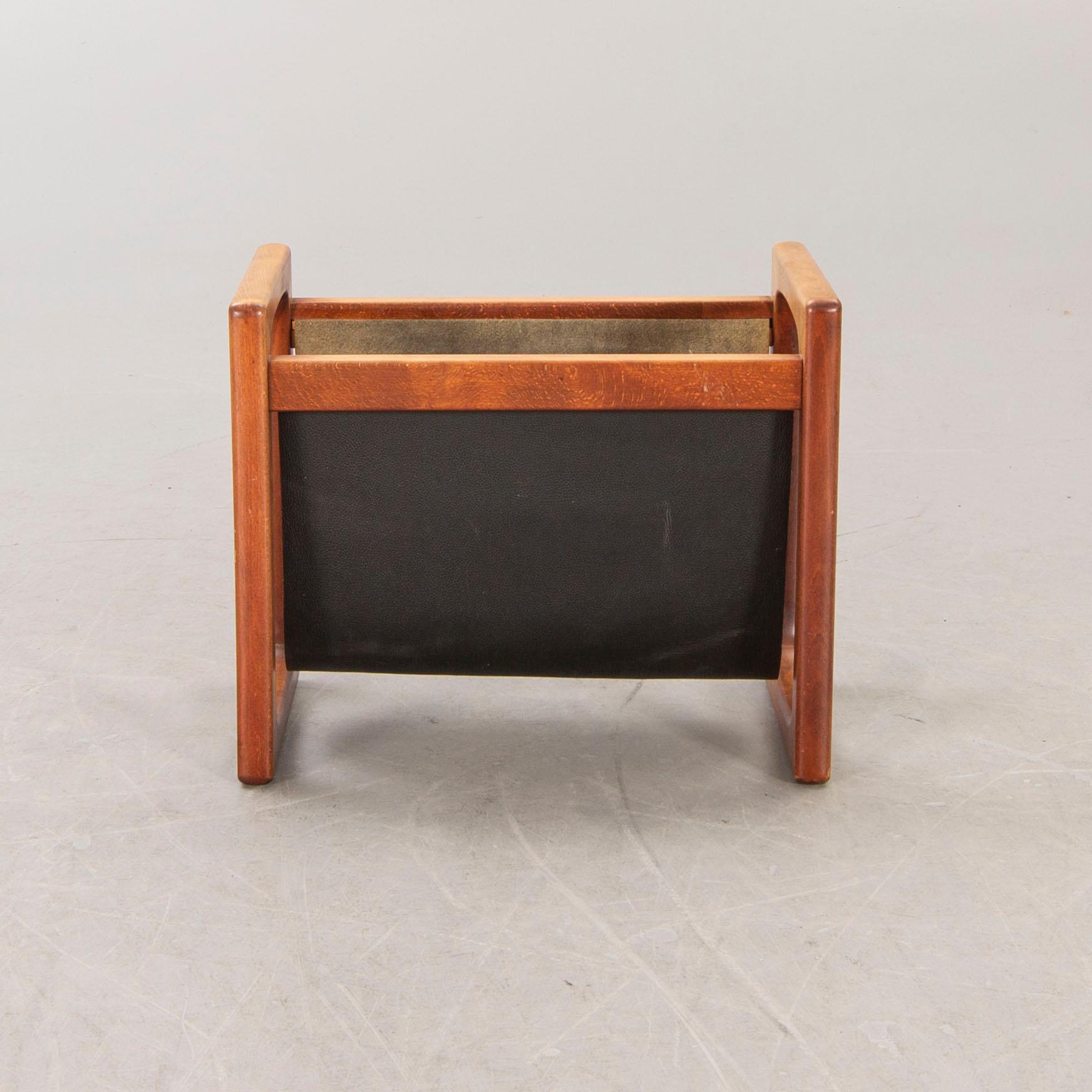 A 1960/70s teak newspaper stand.
