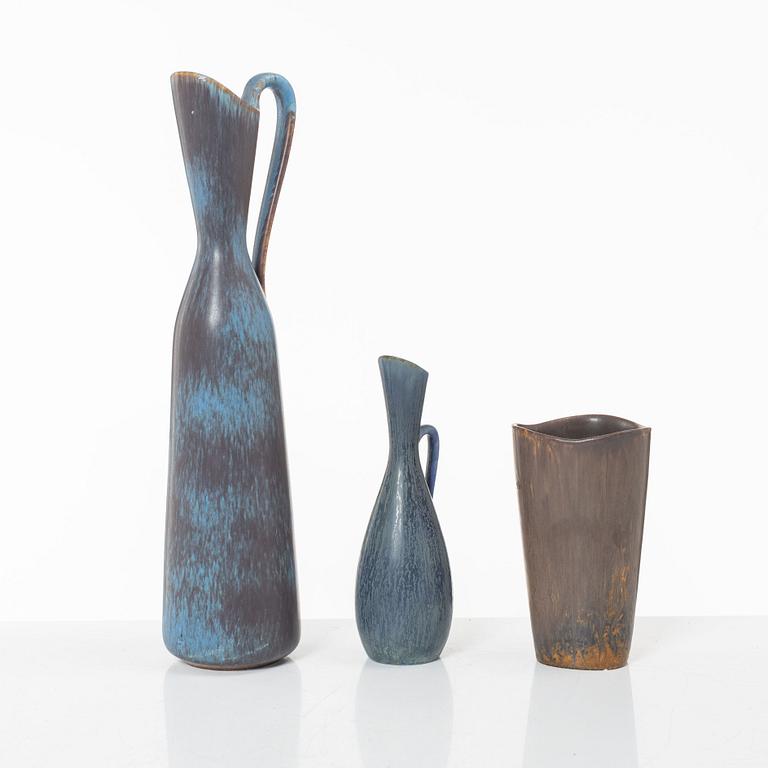 Carl-Harry Stålhane and Gunnar Nylund, two stoneware pitchers jugs and a vase, Rörstrand.