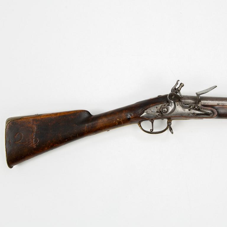 An 18th century flintlock carbine.