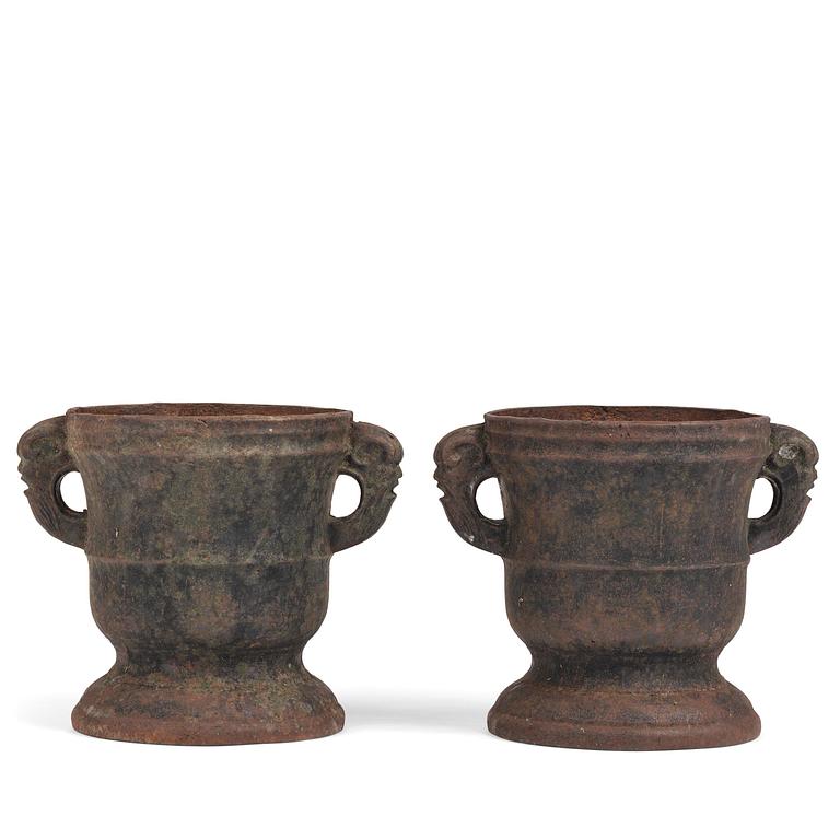 A pair of Swedish cast-iron garden urns, 18th century.