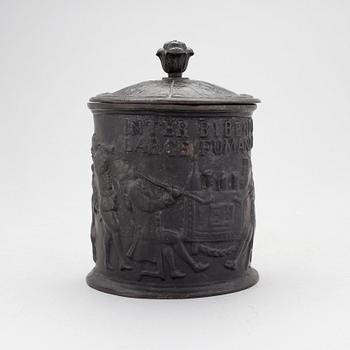 A cast iron lidded tobacco jar, 19th Century.