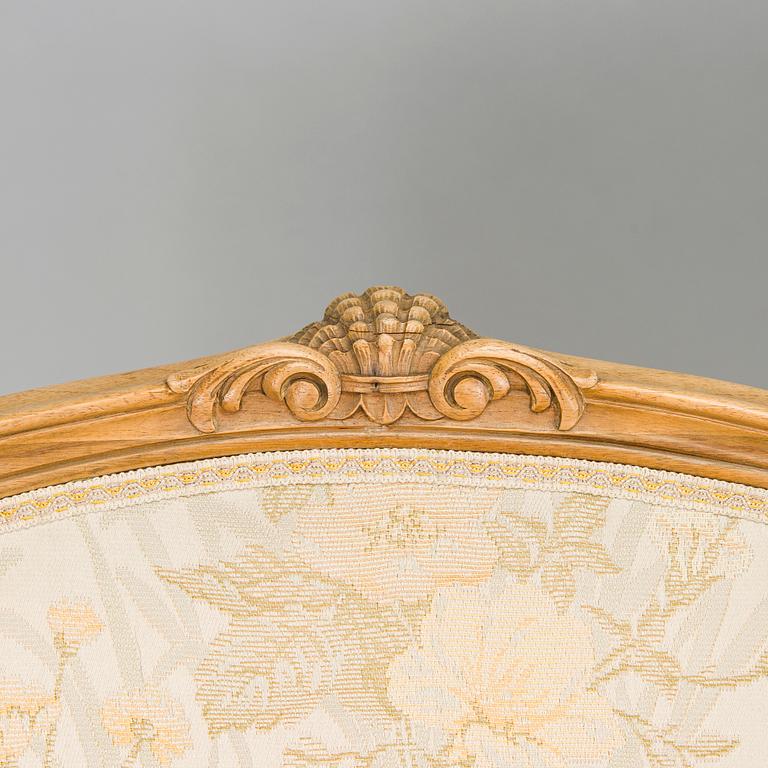 A pair of mid-20th-century French armchairs in Roccoco style.