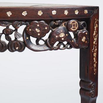 A Chinese hardwood demi-lune side table with mother-of-pearl inlays, late Qing dynasty.