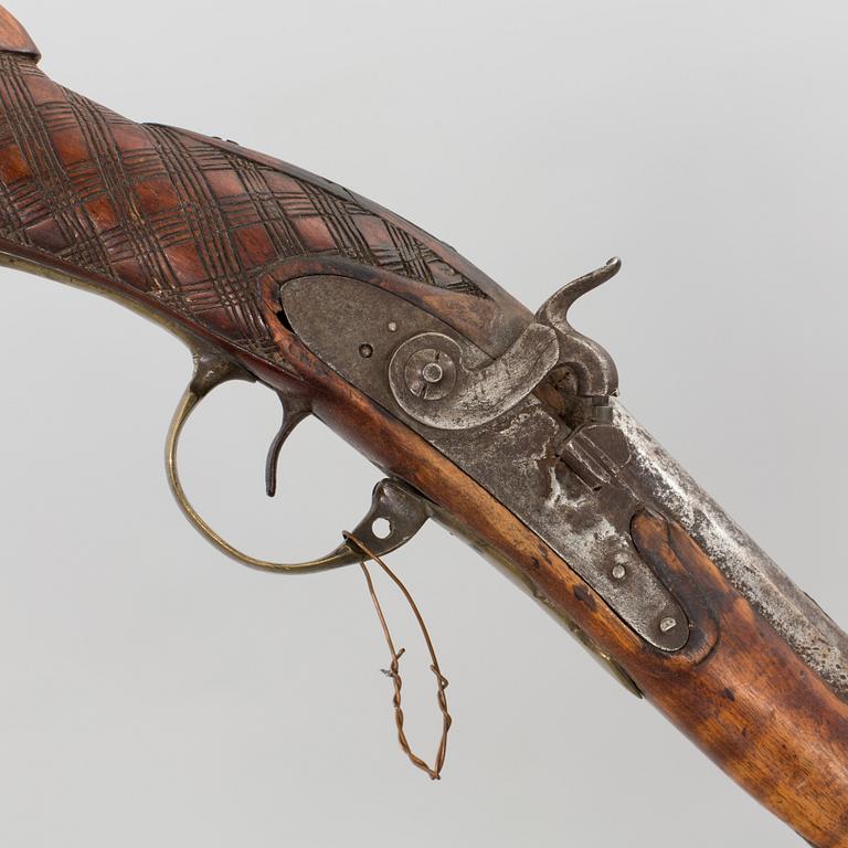 A percussion lock rifle from around 18/19th century,