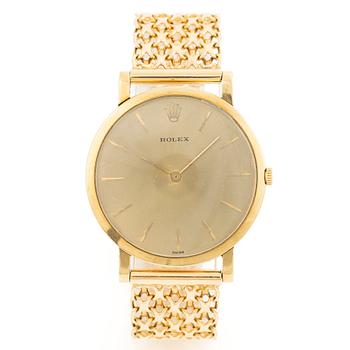 Rolex, 18K gold, with an 18K gold bracelet, wristwatch, 31.5 mm.