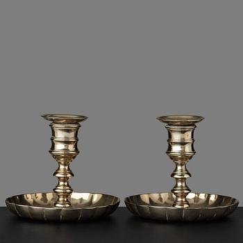 109. A pair of 18th century candlesticks.