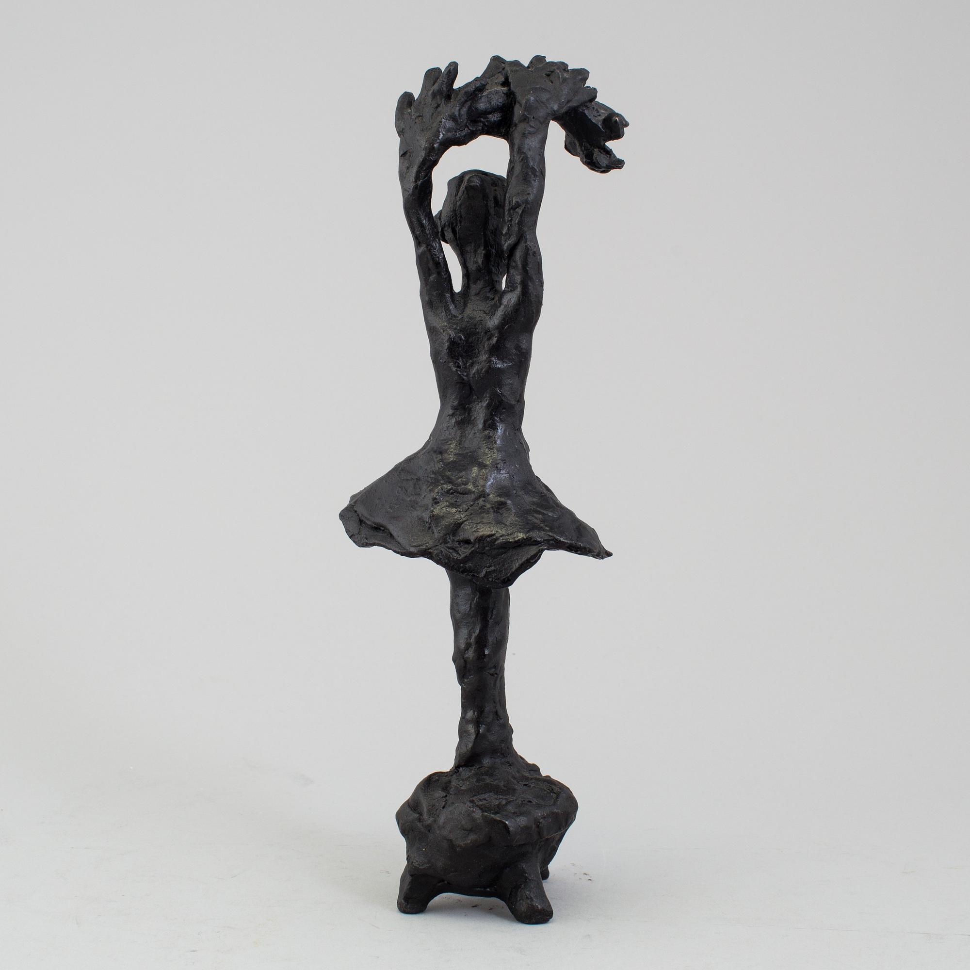 A bronze sculpture by Karin Lind, not signed.
