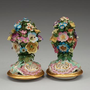 A pair of Meissen pot-purri jars with covers, 19th Century.