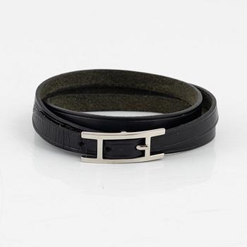 Hermès, a black leather 'Behapi' bracelet.