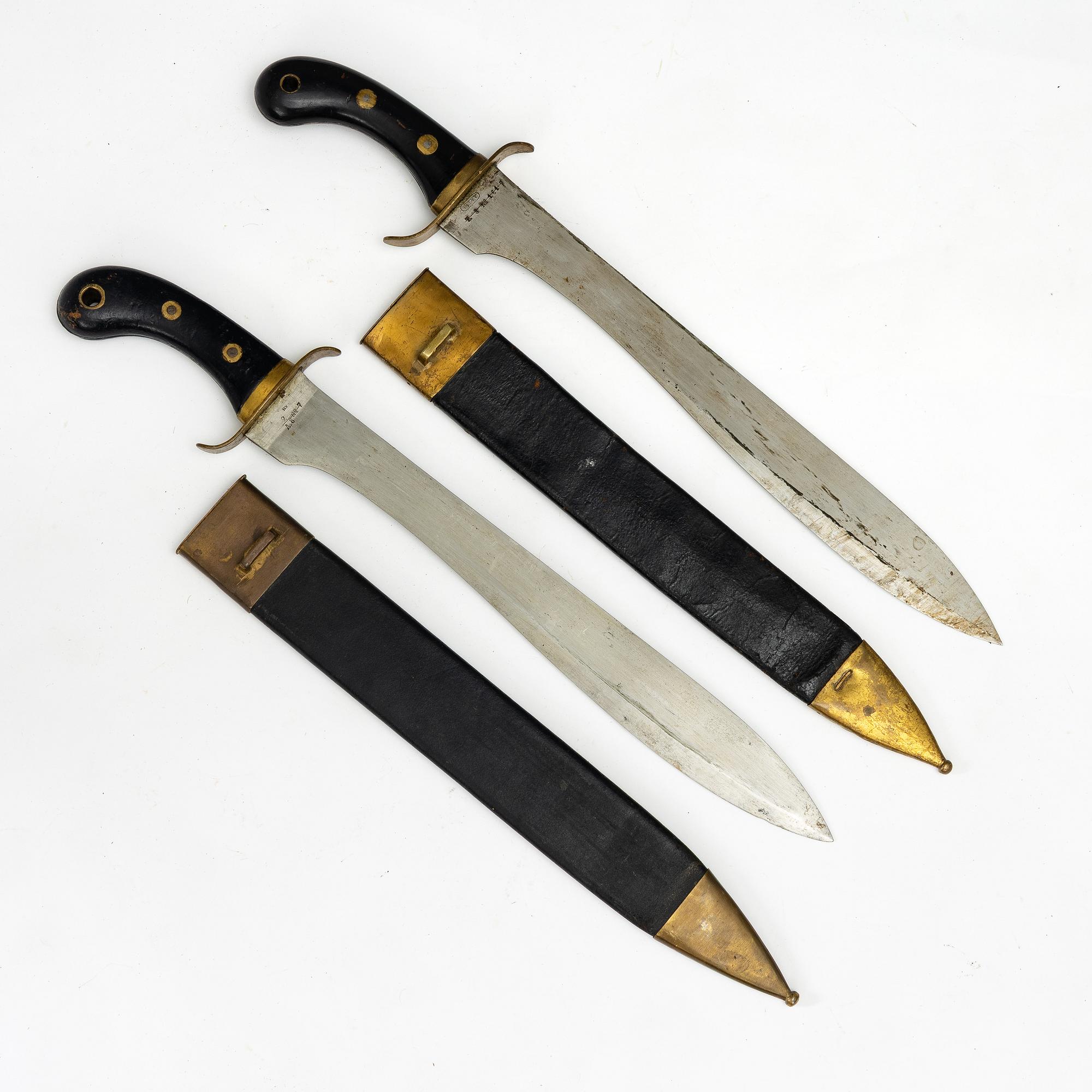 Two Swedish cutlasses 1848 pattern,with scabbards.
