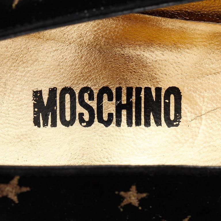 MOSCHINO, a pair of black suede pumps.Size 40,5.