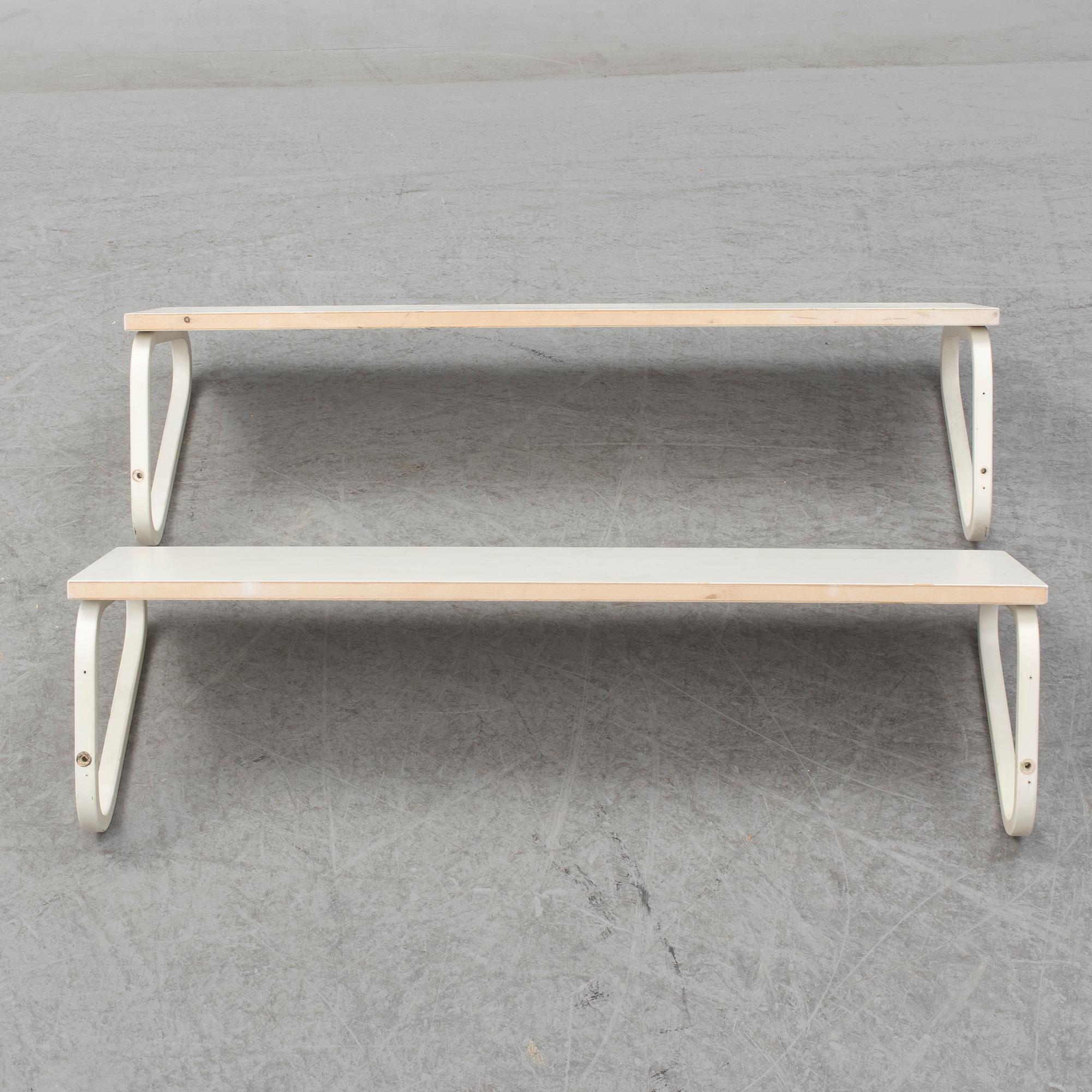 ALVAR AALTO, a pair of model 112 painted wall shelves from Artek, Finland.