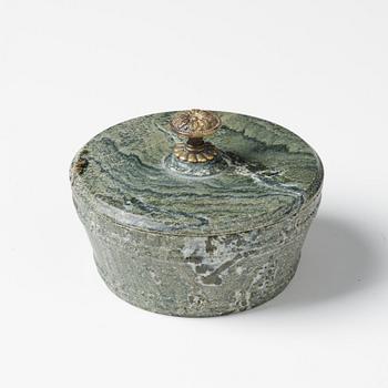 A Swedish Empire 'Kolmård' marble butter box with cover, early 19th century.