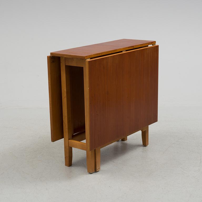 A mid 20th century flap table.