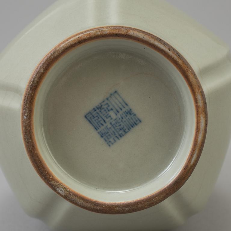A presumably modern made celadon-glazed vase with Qianlong mark.