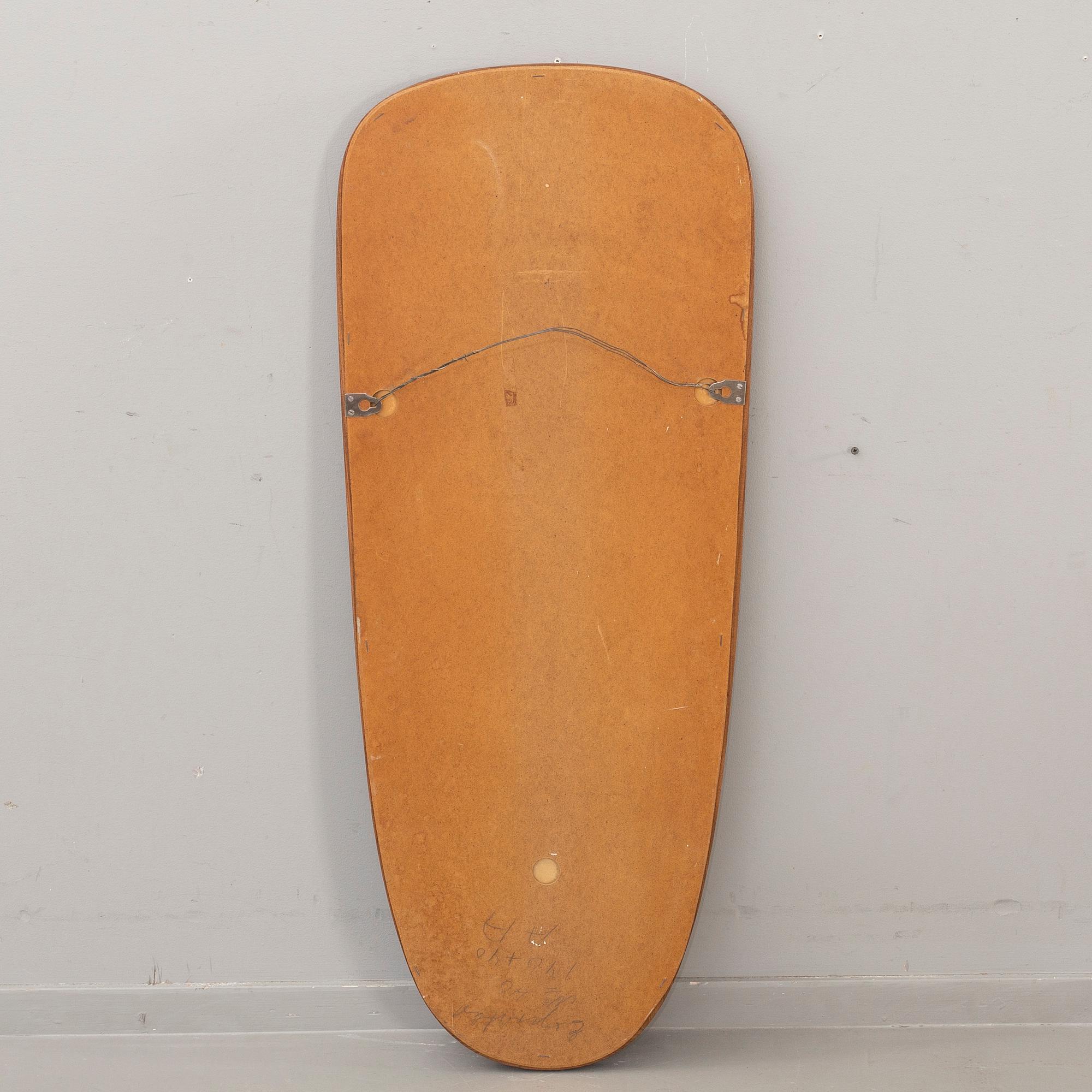 A WALL MIRROR  SWEDISH MODERN.