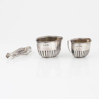 Creamer, sugar bowl, and sugar tongs, silver.