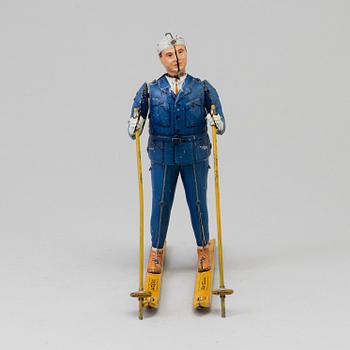 a Lehmann "Ski Rolf" tin toy, Germany 1930-1941.
