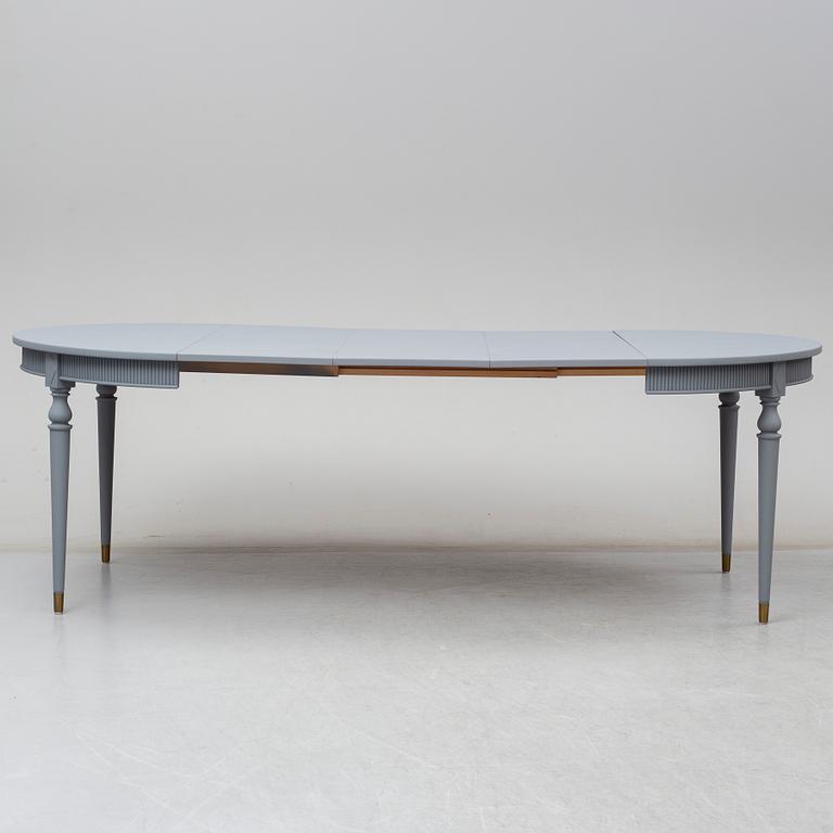 A gustavian style dining table, mid 20th century.