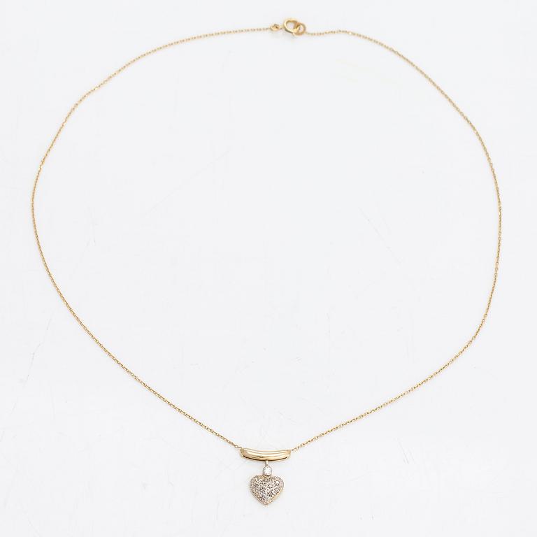 A 14K gold necklace with diamonds ca. 0.08 ct in total.
