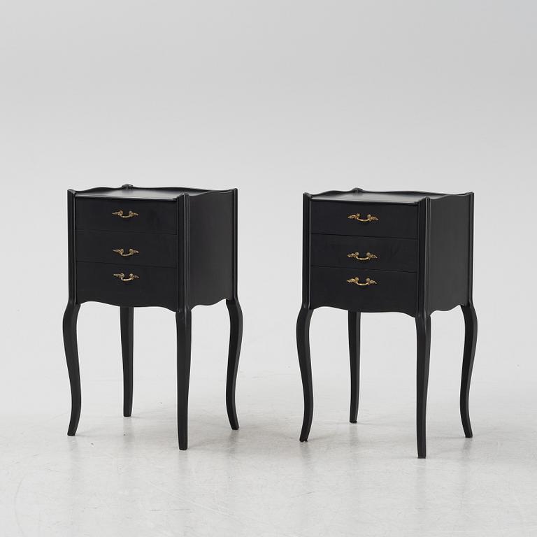 A pair of painted Rococo style bedside tables, second half of the 20th Century.