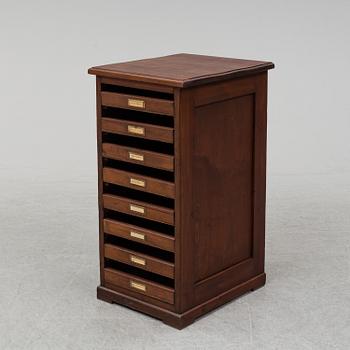 An early 20th Century stained pine office furniture.
