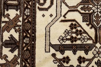 A Ferdos carpet, c. 295 x 210 cm.