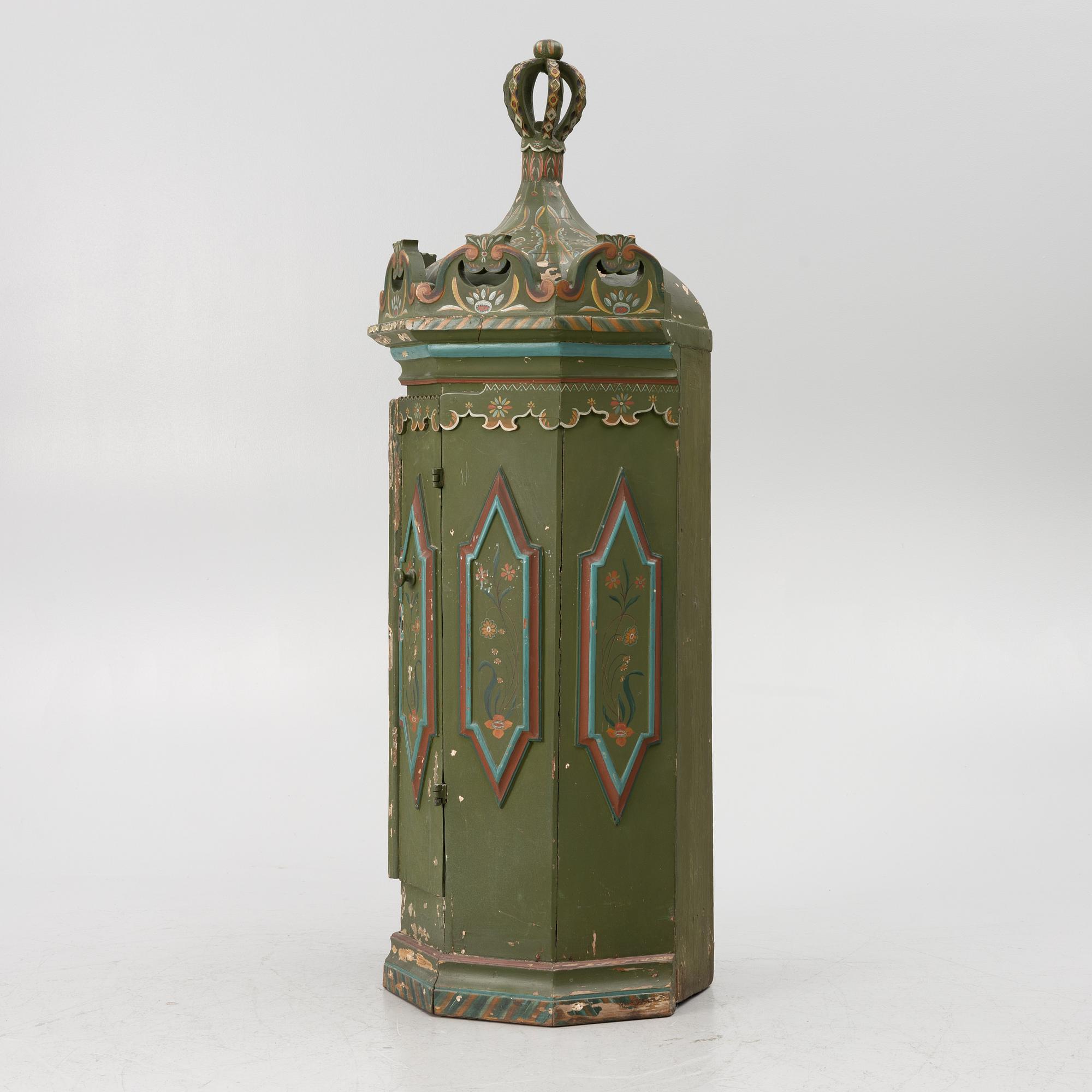 Corner cabinet, likely 18th century.