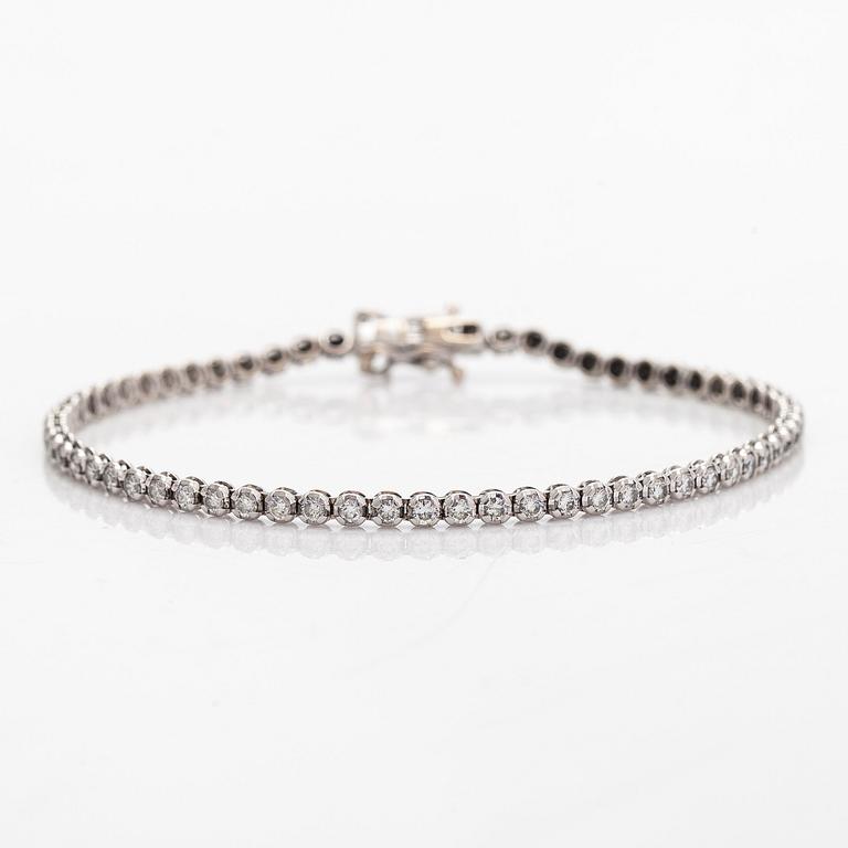 Tennis bracelet, brilliant-cut diamonds totalling 2.70 ct, 18K white gold, Italy.