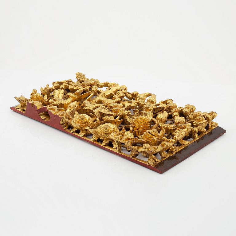 A Chinese carved wooden decor part, 20th Century.