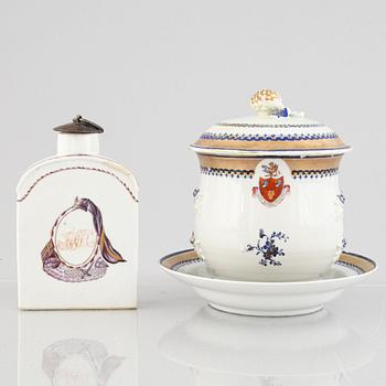 A porcelain tea caddie and mug with cover and saucer, China, Qing dynasty, late 18th century.