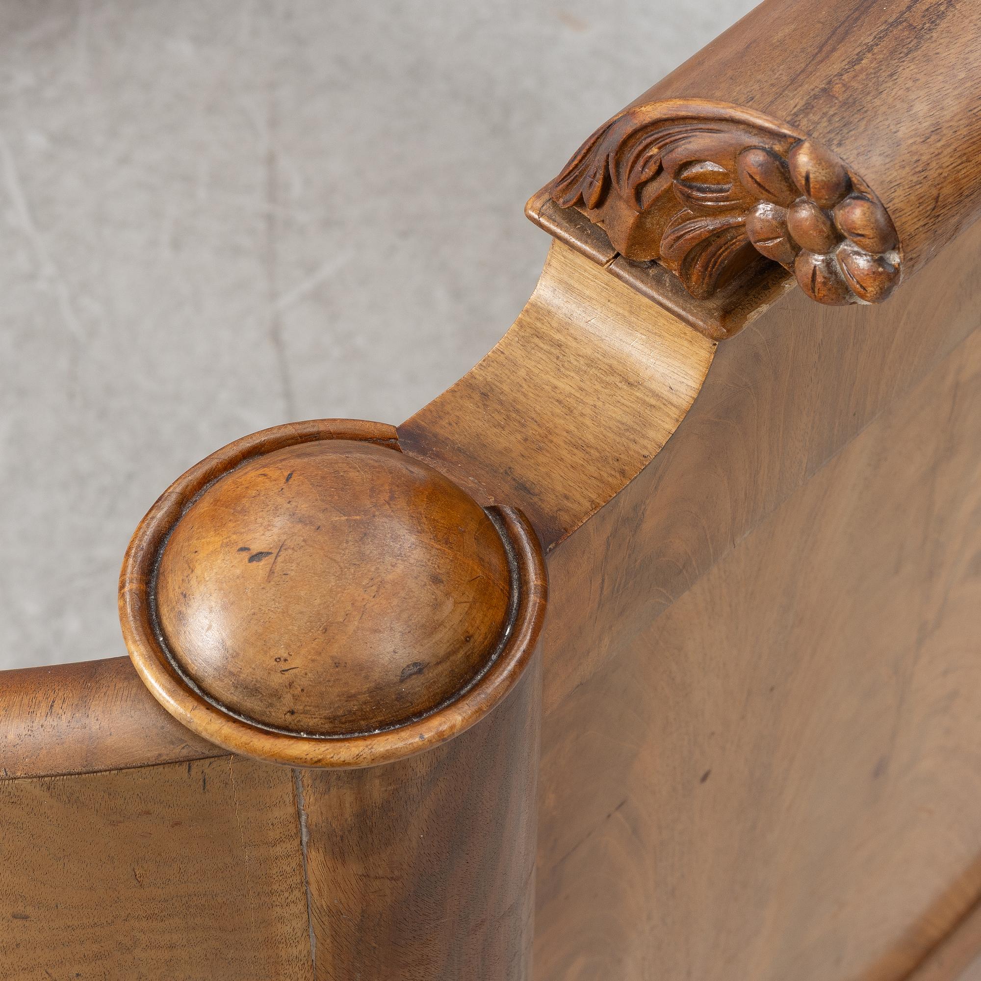 A late Empire bed, mid-19th century.