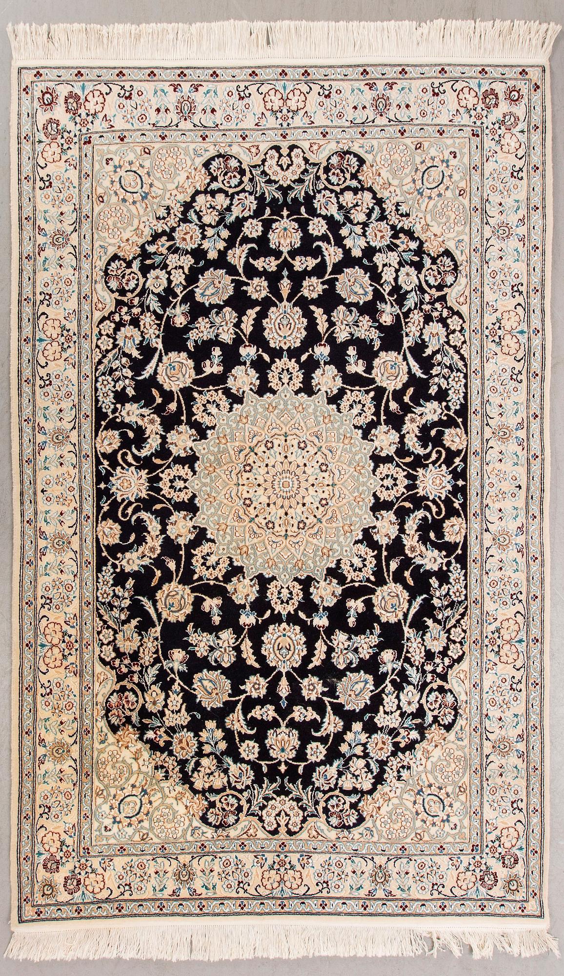 A Nain part silk carpet ca 212x133 cm.