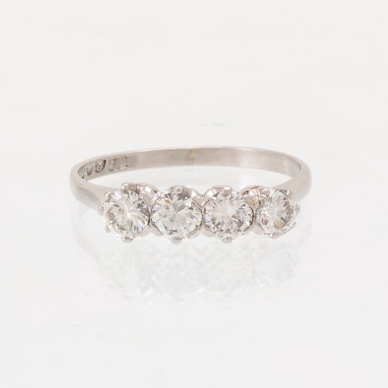A platinum ring set with round brilliant-cut diamonds, Gothenburg 1962.